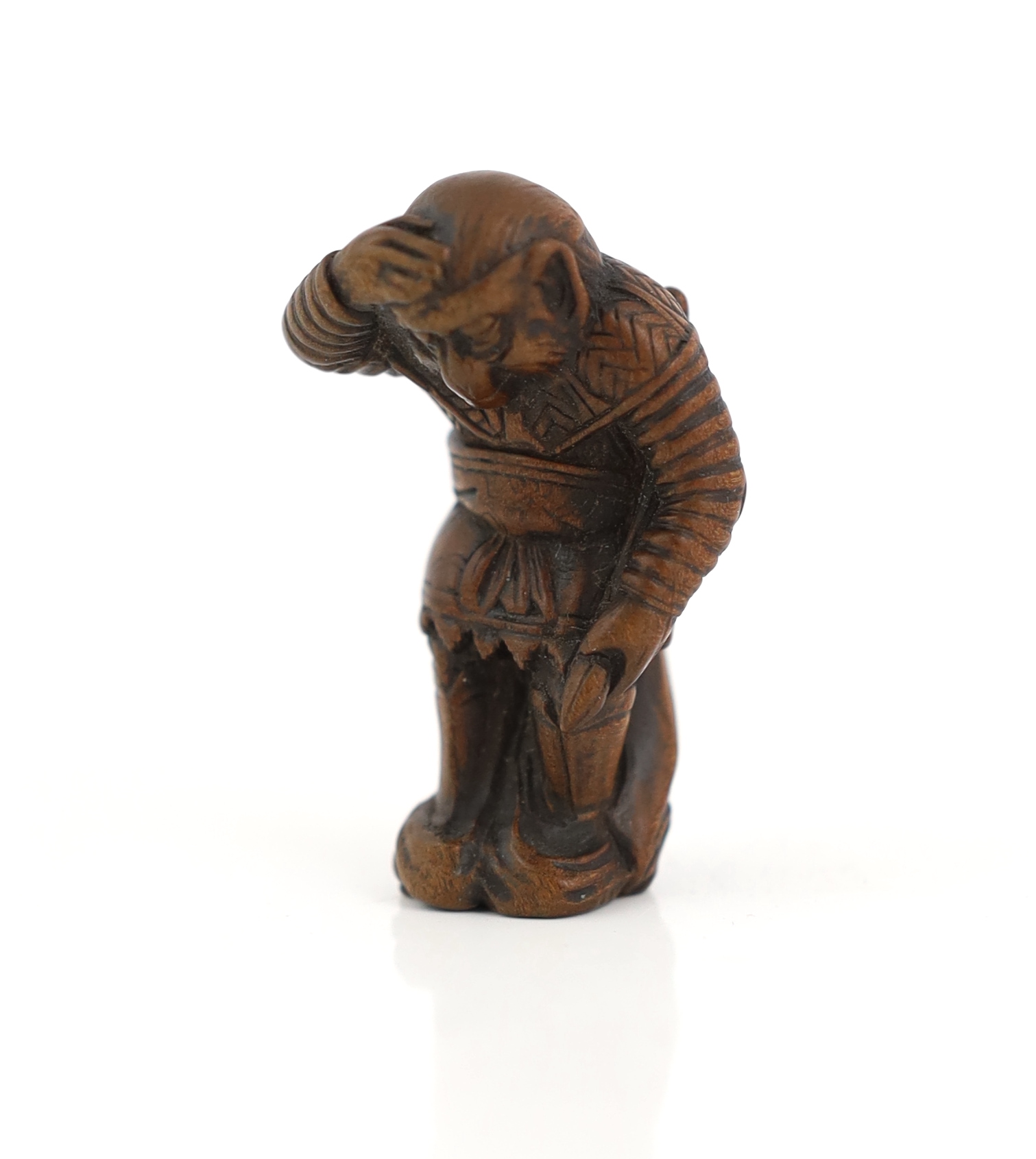 A Japanese wood netsuke of Son Goku (Sun Wukong) flying on his cloud somersault, early 19th century, signed Sentsu